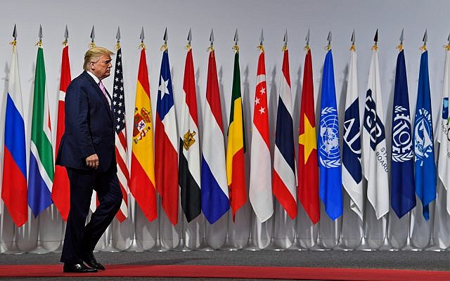US President Donald Trump arrives to greet Japanese Prime Minister Shinzo Abe at the G-20 summit in Osaka, Japan, June 28, 2019. (AP Photo/Susan Walsh) US President Donald Trump arrives to greet Japanese Prime Minister Shinzo Abe at the G-20 summit in Osaka, Japan, June 28, 2019. (AP Photo/Susan Walsh)