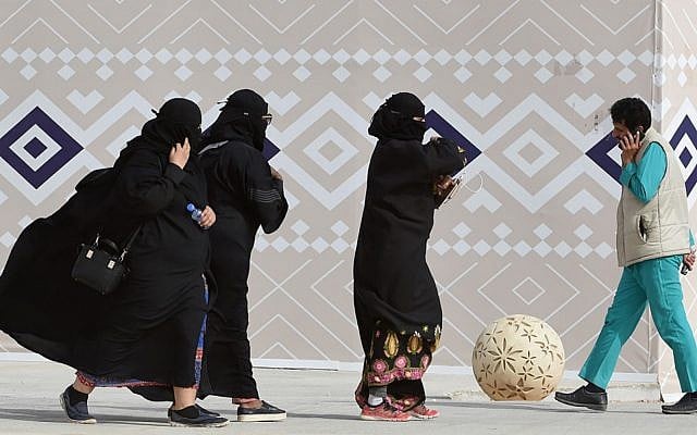 Illustrative: Saudi women walk during the King Abdulaziz Camel Festival in Rumah, some 160 kilometers east of Riyadh, January 19, 2018. (Fayez Nureldine/AFP) Illustrative: Saudi women walk during the King Abdulaziz Camel Festival in Rumah, some 160 kilometers east of Riyadh, January 19, 2018. (Fayez Nureldine/AFP)