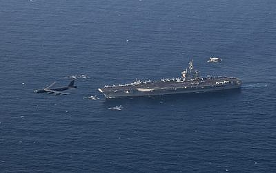 The USS Abraham Lincoln Carrier Strike Group and a US Air Force B-52H Stratofortress conduct joint exercises in the in the Arabian Sea, June 1, 2019. (US Navy photo by Mass Communication Specialist 1st Class Brian M. Wilbur/Released)