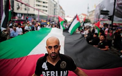 Protestors attend an al-Quds Day rally in Berlin, July 25, 2014. (AP Photo/Markus Schreiber)