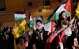 Hezbollah supporters take part in a rally to mark the anti-Israel al-Quds day in Beirut, Lebanon, May 31, 2019. (AP Photo/Hassan Ammar)