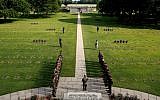 German soldiers stand during a moment of remembrance in the German cemetery of La Cambe, in Normandy, France, June 3, 2019. (AP Photo/Thibault Camus)