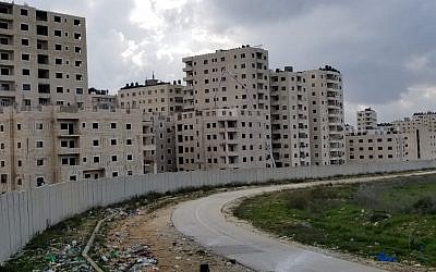 The security barrier that has cut Kafr Aqab off from the rest of Jerusalem on February 20, 2019. (Adam Rasgon/Times of Israel)