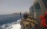 Israeli naval forces prepare to board a Turkish ship which was apparently set on fire by a Turkish stowaway as it lay off the coast of Israel, June 9, 2019. (Israel Defense Forces)
