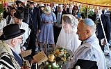 Roque Pugliese and Ivana Pezzoli getting married at the Bova Marina Synagogue in Calabria, Italy on June 4, 2019. (Courtesy of Shavei Israel via JTA)