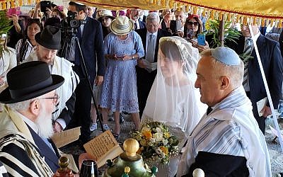 Roque Pugliese and Ivana Pezzoli getting married at the Bova Marina Synagogue in Calabria, Italy on June 4, 2019. (Courtesy of Shavei Israel via JTA)