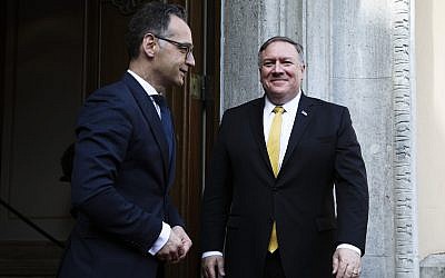 German Foreign Minister Heiko Maas, left, welcomes United States Secretary of State Mike Pompeo, right, at the foreign ministry's guest house, Villa Borsig, for talks in Berlin, Germany, May 31, 2019. (AP Photo/Markus Schreiber, Pool)