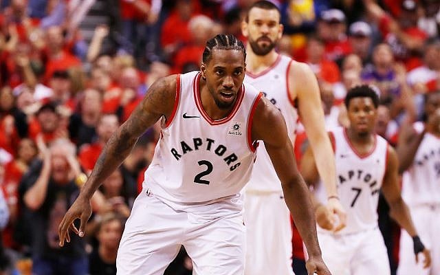 Toronto Raptors star Kawhi Leonard, in front of teammates Marc Gasol (second from left) and Kyle Lowry, reacts during game five of the 2019 NBA Finals against the Golden State Warriors at Scotiabank Arena in Toronto, June 10, 2019. (Gregory Shamus/Getty Images) Toronto Raptors star Kawhi Leonard, in front of teammates Marc Gasol (second from left) and Kyle Lowry, reacts during game five of the 2019 NBA Finals against the Golden State Warriors at Scotiabank Arena in Toronto, June 10, 2019. (Gregory Shamus/Getty Images)