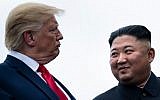 US President Donald Trump and North Korea's leader Kim Jong Un talk before a meeting in the Demilitarized Zone (DMZ) on June 30, 2019, in Panmunjom, Korea. (Brendan Smialowski / AFP)