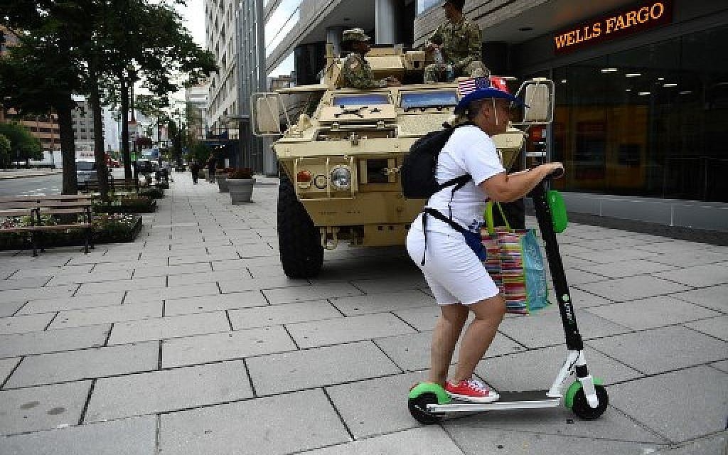 An Armored Personnel Carrier (APC) is parked on a sidewalk in Washington, DC, on July 4, 2019.  (Brendan Smialowski / AFP)