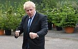 Conservative MP and leadership contender Boris Johnson gestures during a leadership campaign visit to a nursery in Braintree, southeast England, on July 13, 2019. (Neil Hall/Pool/AFP)