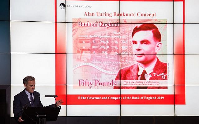 Mark Carney, governor of the Bank of England, speaks in front of the concept design for the new Bank of England 50 pound banknote, featuring mathematician and scientist Alan Turing, during the presentation at the Science and Industry Museum in Manchester, north-west England on July 15, 2019. (OLI SCARFF / AFP) Mark Carney, governor of the Bank of England, speaks in front of the concept design for the new Bank of England 50 pound banknote, featuring mathematician and scientist Alan Turing, during the presentation at the Science and Industry Museum in Manchester, north-west England on July 15, 2019. (OLI SCARFF / AFP)