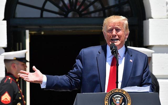 US President Donald Trump takes part in the 3rd Annual Made in America Product Showcase on the South Lawn at the White House in Washington, DC, on July 15, 2019. (Nicholas Kamm / AFP) US President Donald Trump takes part in the 3rd Annual Made in America Product Showcase on the South Lawn at the White House in Washington, DC, on July 15, 2019. (Nicholas Kamm / AFP)