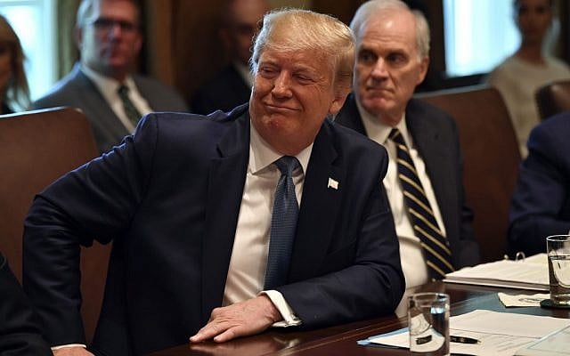 US President Donald Trump participates in a Cabinet meeting at the White House on July 16, 2019 in Washington,DC. (Nicholas Kamm / AFP) US President Donald Trump participates in a Cabinet meeting at the White House on July 16, 2019 in Washington,DC. (Nicholas Kamm / AFP)