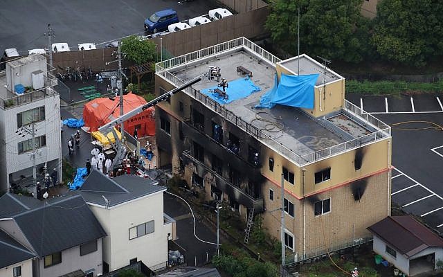 This aerial view shows the rescue and recover scene after a fire at an animation company building killed at least 33 people in Kyoto on July 18, 2019. (Photo by JIJI PRESS / JIJI PRESS / AFP) This aerial view shows the rescue and recover scene after a fire at an animation company building killed at least 33 people in Kyoto on July 18, 2019. (Photo by JIJI PRESS / JIJI PRESS / AFP)