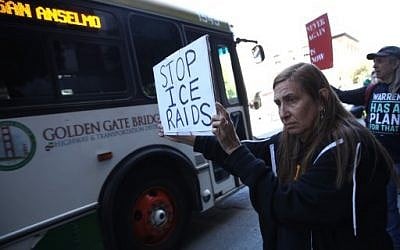 Protesters hold signs during a demonstration outside of the San Francisco office of the Immigration and Customs Enforcement (ICE) on July 12, 2019 in San Francisco, California. Over 150 activists staged a demonstration outside of the ICE offices in San Francisco to demand that immigrant detention centers at the southern border be shut down. Protests are being held in cities across the country.  ( Justin Sullivan/Getty Images/AFP)