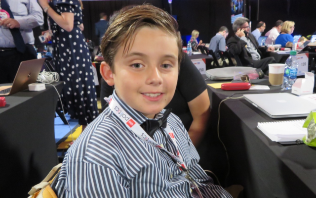 Jefferson Henry Kraft is (probably) the youngest correspondent in the Democratic debate spin room in Detroit on July 30, 2019. (Ron Kampeas/JTA) Jefferson Henry Kraft is (probably) the youngest correspondent in the Democratic debate spin room in Detroit on July 30, 2019. (Ron Kampeas/JTA)