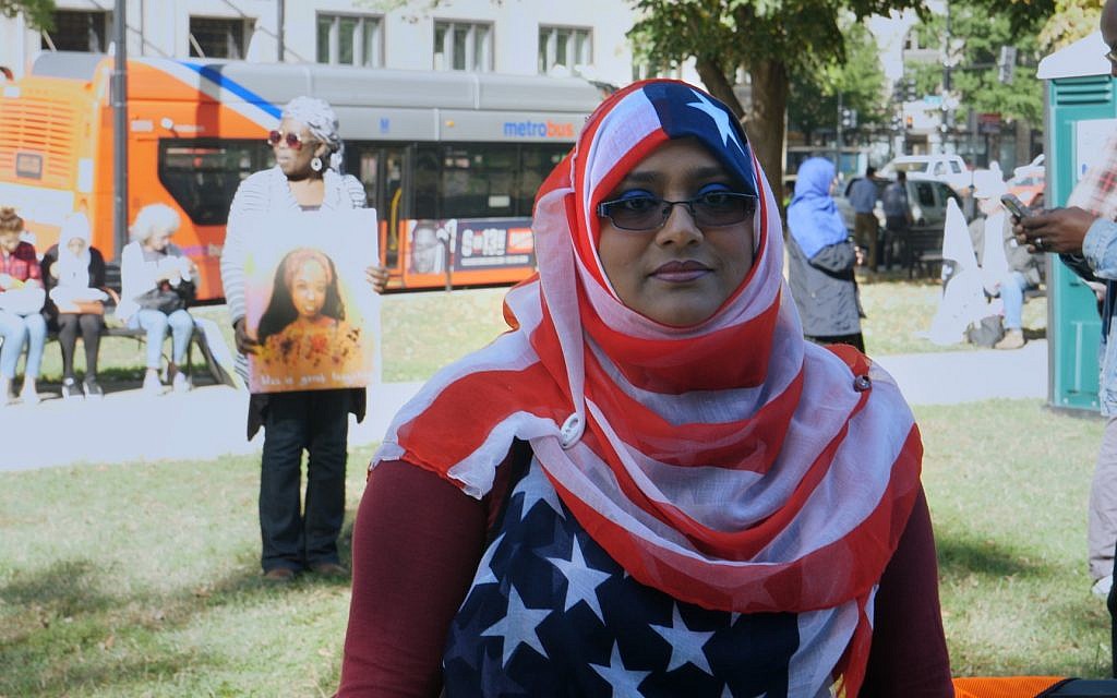 Yemeni-American woman with flag hijab. (Adam Zucker)