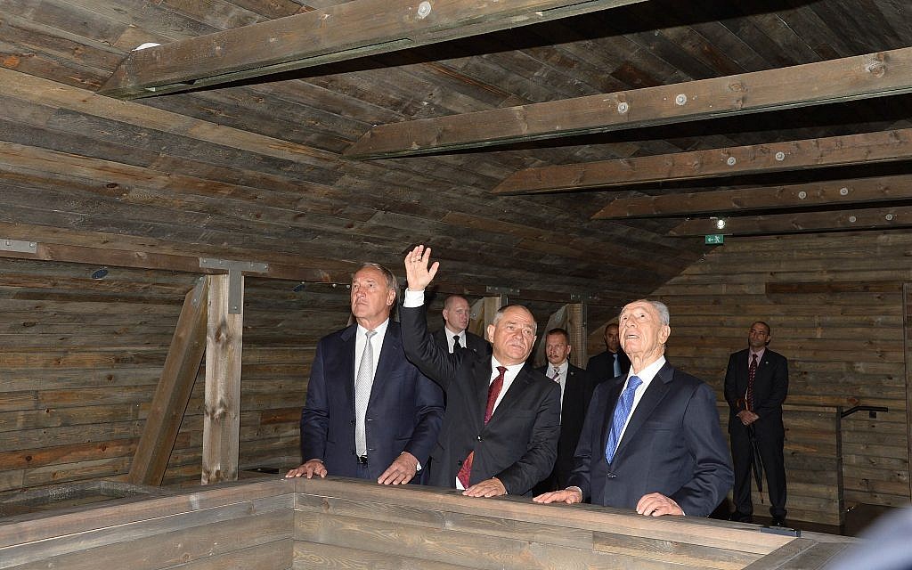Israeli President Shimon Peres, right, and Latvia President Andris Berzinns attend the opening of the Zanis Lipke Memorial Museum in Riga, Latvia on July 30, 2013. (Moshe Milner/GPO via Getty Images)\/via JTA)