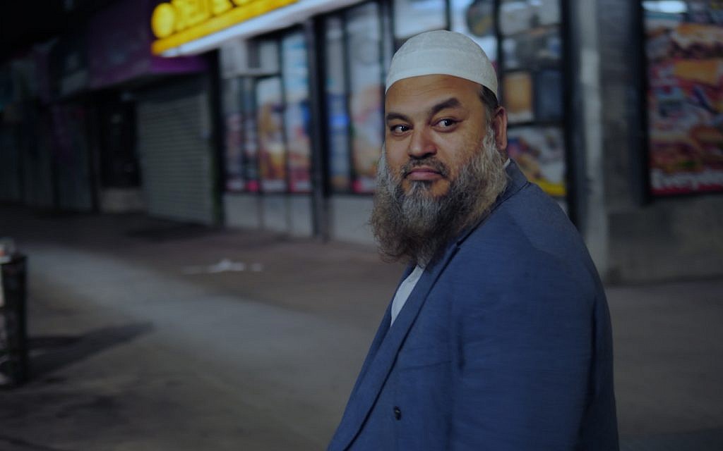 Kobir Chowdhury on way to prayers in pre-dawn hour. (Adam Zucker)