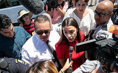 Rep. Alexandria Ocasio-Cortez speaks to the media after visiting the detention facility in Clint, Texas on July 1, 2019. (Christ Chavez/Getty Images/via JTA)