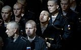 Sailors attend a service to commemorate the 14 crew members who were killed on one of the Russian navy's deep-sea research submersibles at Kronshtadt Navy Cathedral outside St. Petersburg, Russia, Thursday, July 4, 2019. (AP Photo/Dmitri Lovetsky)
