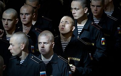 Sailors attend a service to commemorate the 14 crew members who were killed on one of the Russian navy's deep-sea research submersibles at Kronshtadt Navy Cathedral outside St. Petersburg, Russia, Thursday, July 4, 2019. (AP Photo/Dmitri Lovetsky)