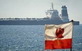The Grace 1 super tanker, suspected of carrying Iranian crude oil to Syria in violation of EU sanctions, in the British territory of Gibraltar after it was detained, July 4, 2019. (AP Photo/Marcos Moreno)