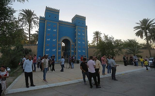 People visit the archaeological site of Babylon, Iraq, Friday, July 5, 2019. (AP Photo/Anmar Khalil)