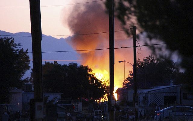 Smoke rises from a fire that broke out behind the Casa Corona restaurant following an earthquake in Ridgecrest, California, July 5, 2019. (Jessica Weston/The Daily Independent via AP) Smoke rises from a fire that broke out behind the Casa Corona restaurant following an earthquake in Ridgecrest, California, July 5, 2019. (Jessica Weston/The Daily Independent via AP)