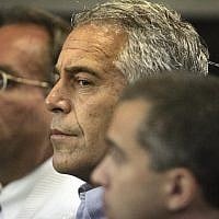 Jeffrey Epstein, center, appears in court in West Palm Beach, Florida, July 30, 2008. (Uma Sanghvi/Palm Beach Post via AP)