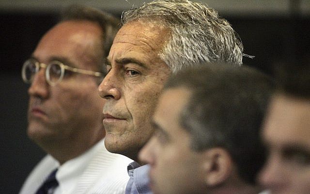 Jeffrey Epstein, center, appears in court in West Palm Beach, Florida, on July 30, 2008. (Uma Sanghvi/Palm Beach Post via AP, File) Jeffrey Epstein, center, appears in court in West Palm Beach, Florida, on July 30, 2008. (Uma Sanghvi/Palm Beach Post via AP, File)