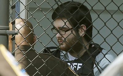 James Alex Fields Jr., is led out of General District Court courthouse after his sentencing on state charges, July 15, 2019, in Charlottesville, Virginia. (AP Photo/Steve Helber)