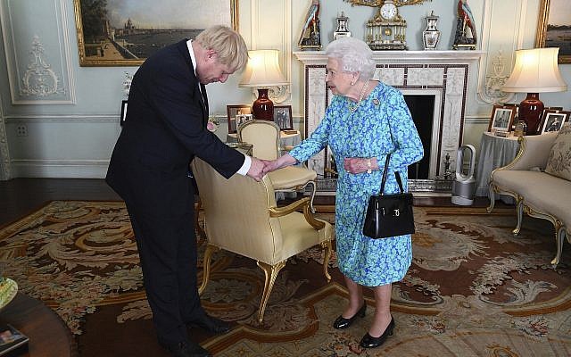 Britain's Queen Elizabeth II welcomes newly elected leader of the Conservative party Boris Johnson during an audience at Buckingham Palace, London, Wednesday July 24, 2019, where she invited him to become Prime Minister and form a new government. (Victoria Jones/Pool via AP) Britain's Queen Elizabeth II welcomes newly elected leader of the Conservative party Boris Johnson during an audience at Buckingham Palace, London, Wednesday July 24, 2019, where she invited him to become Prime Minister and form a new government. (Victoria Jones/Pool via AP)