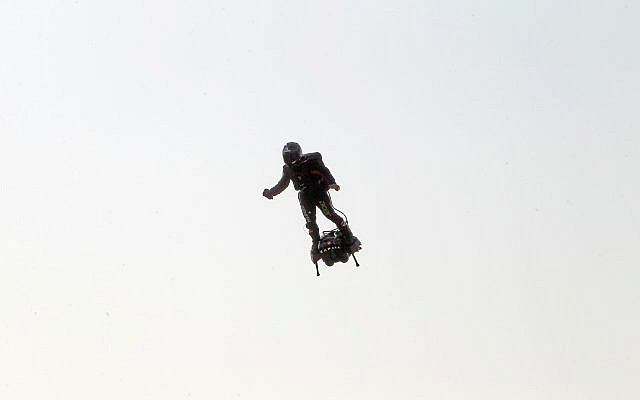 Franky Zapata, a 40-year-old inventor, takes to the air in Sangatte, northern France, at the start of his attempt to cross the channel from France to England, July 25, 2019. (AP Photo/Michel Spingler) Franky Zapata, a 40-year-old inventor, takes to the air in Sangatte, northern France, at the start of his attempt to cross the channel from France to England, July 25, 2019. (AP Photo/Michel Spingler)