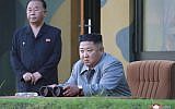 In this July 25, 2019, photo provided on July 26, 2019, by the North Korean government, North Korean leader Kim Jong Un watches a missile test in North Korea. (Korean Central News Agency/Korea News Service via AP)