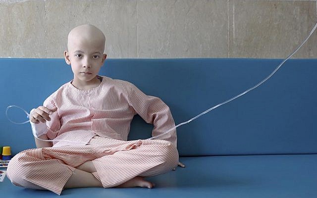 In this June 19, 2019 photo, Taha Shakouri, an 8-year-old boy suffering from liver cancer, sits in his room at Mahak Children's Hospital in Tehran, Iran (AP Photo/Ebrahim Noroozi) In this June 19, 2019 photo, Taha Shakouri, an 8-year-old boy suffering from liver cancer, sits in his room at Mahak Children's Hospital in Tehran, Iran (AP Photo/Ebrahim Noroozi)