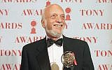 Harold Prince holds his Tony award for best director in a musical for 'Show Boat,' at Broadway's Minskoff Theater in New York, June 4, 1995. (AP Photo/Richard Drew, File)