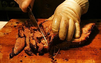 Illustrative: Texas style brisket Tuesday, June 14, 2005, in Reynoldsburg, Ohio. (AP Photo/Kiichiro Sato)