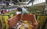 Israeli postal workers sort mail at a post office in Tel Aviv, February 22, 2010. (AP/Dan Balilty)
