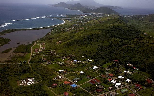 This Sept. 23, 2011 file photo, shows an aerial view of the Caribbean island of St. Kitts. (AP/Ramon Espinosa) This Sept. 23, 2011 file photo, shows an aerial view of the Caribbean island of St. Kitts. (AP/Ramon Espinosa)
