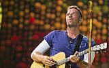 Chris Martin of Coldplay performs at Metlife Stadium on Tuesday, August 1, 2017, in East Rutherford, N.J. (Scott Roth/Invision/AP)
