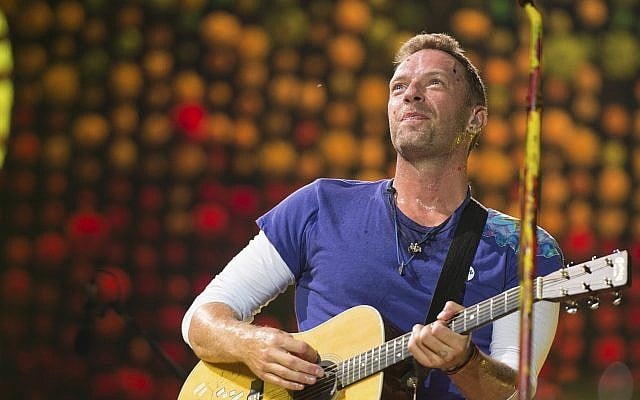 Chris Martin of Coldplay performs at Metlife Stadium on Tuesday, August 1, 2017, in East Rutherford, N.J. (Scott Roth/Invision/AP)