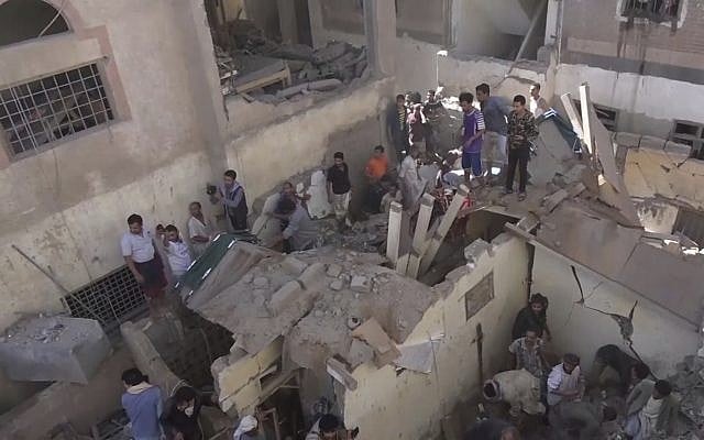 In this frame grab from from video, people search in the rubble following Saudi-led coalition airstrikes that killed at least six, including children, officials said, in the residential center of the capital, Sanaa, Yemen, May 16, 2019. (AP Photo) In this frame grab from from video, people search in the rubble following Saudi-led coalition airstrikes that killed at least six, including children, officials said, in the residential center of the capital, Sanaa, Yemen, May 16, 2019. (AP Photo)