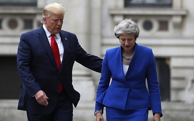 Britain's Prime Minister Theresa May and US President Donald Trump walk through the Quadrangle of the Foreign Office for a joint press conference in central London, June 4, 2019. (AP Photo/Frank Augstein) Britain's Prime Minister Theresa May and US President Donald Trump walk through the Quadrangle of the Foreign Office for a joint press conference in central London, June 4, 2019. (AP Photo/Frank Augstein)