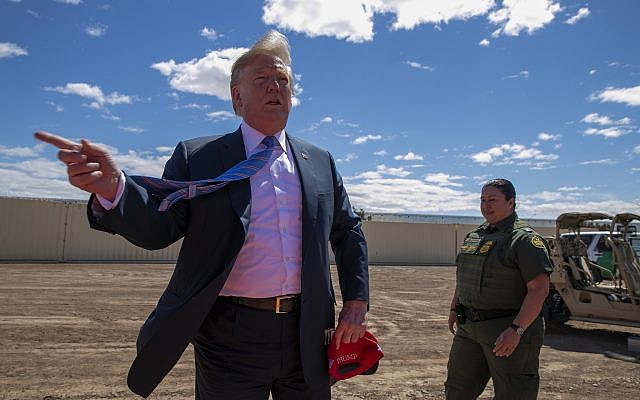 In this photo from April 5, 2019 US President Donald Trump speaks as he visits a new section of the border wall with Mexico in Calexico, California. (AP Photo/Jacquelyn Martin, File) In this photo from April 5, 2019 US President Donald Trump speaks as he visits a new section of the border wall with Mexico in Calexico, California. (AP Photo/Jacquelyn Martin, File)