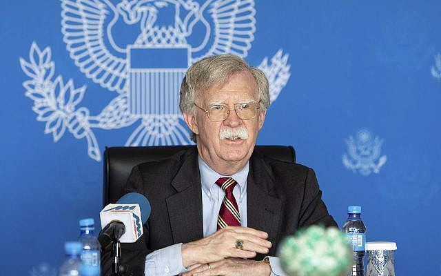 US National Security Adviser John Bolton speaks to the press at the Chinggis Khaan International Airport near Ulaanbaatar, Mongolia, July 1, 2019. (US Embassy Ulaanbaatar via AP) US National Security Adviser John Bolton speaks to the press at the Chinggis Khaan International Airport near Ulaanbaatar, Mongolia, July 1, 2019. (US Embassy Ulaanbaatar via AP)
