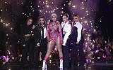 FILE - In this Nov. 4, 2018 file photo, Nicki Minaj performs on stage during the MTV EMA's 2018 at Bilbao Exhibition Centre in Bilbao, Spain.