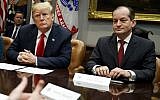 FILE - In this Sept. 17, 2018, file photo, US President Donald Trump, left, and Labor Secretary Alexander Acosta (R) listen during a meeting of the President's National Council of the American Worker in the Roosevelt Room of the White House in Washington (AP Photo/Evan Vucci, File)