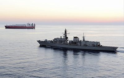 British navy vessel HMS Montrose escorts another ship during a mission at sea off coast of Cyprus in February 2014. (UK Ministry of Defence via AP)